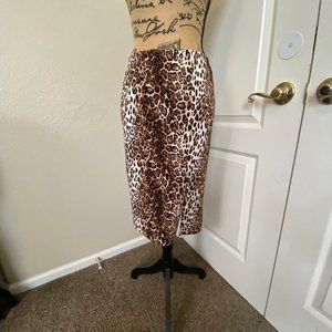 WHBM Leopard print, lined, slim, knee length skirt. Size 2